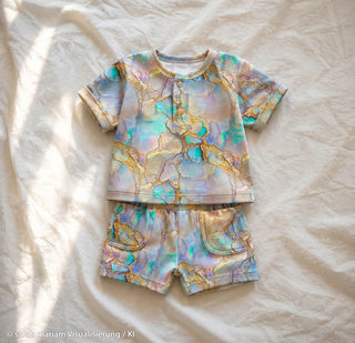 French Terry Stoff - Flowing Bloom Marmorierung in Perlmutt/Gold