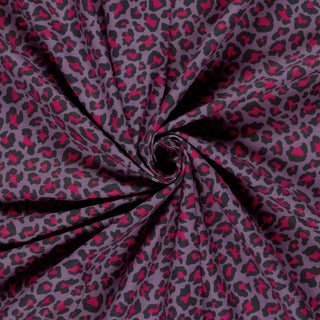 Baumwollstoff Popeline Leopardenmuster in Pink auf Aubergine – Farben und Struktur