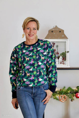 French Terry Stoff angeraut – Bunter Weihnachtsschmuck mit Einhorn und Flamingo – Ansicht 3