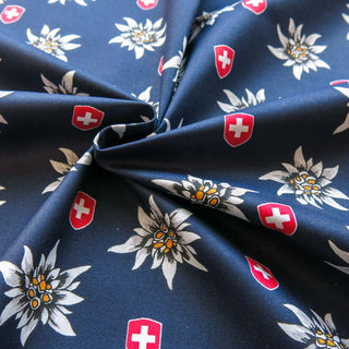 Beschichtete Baumwolle - Edelweiss und Schweizer Wappen auf Dunkelblau