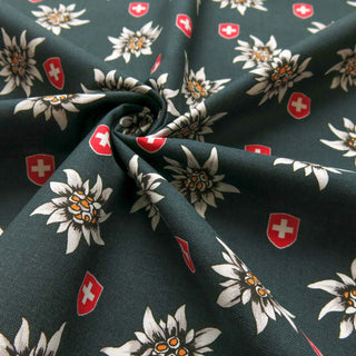 Baumwolle - Edelweiss und Schweizer Wappen auf Schwarz Stoffe kaufen